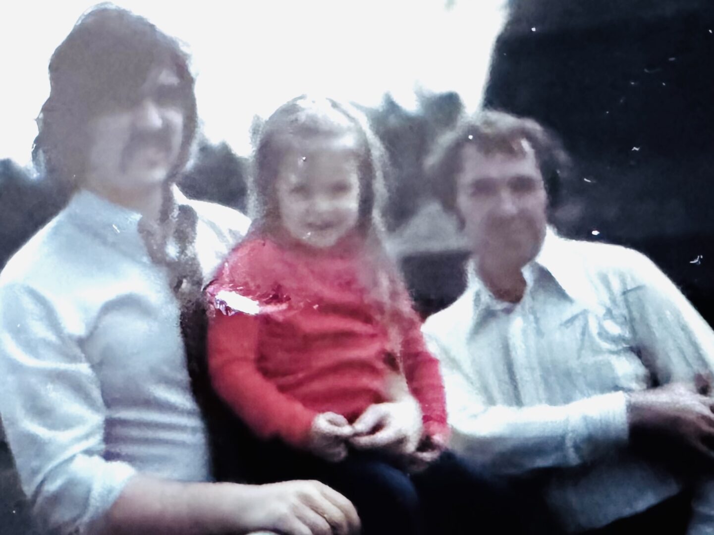 Vintage photo of two men and child